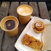 Coffee, Oat Caramel Latte, cinnamon bun and rasberry+nectarine crumble slice at Olive & Co.  in Liskeard