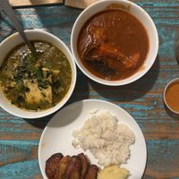 Okra stew with tofu, tomato stew with mushrooms, plantains, rice, corn fufu  at Akadi in Portland