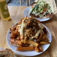 Pommes spezial (vegan cheese sauce and caramelized onions)  at Vöner der Vegetarische Döner in Berlin