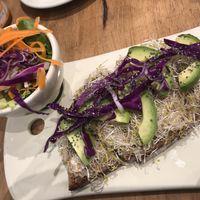 Tartine with hummus, chia seeds, red cabbage and avocado on brown sourdough bread at Le Pain Quotidien - Reforma in Mexico City