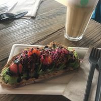 delicious avocado toast and oat milk latte!💗 at Green Gorilla in Lausanne