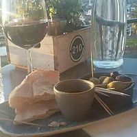 Wine & olives on the middle floor terrace. at Twenty1 Lounge in Torquay