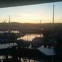 The middle floor terrace with the sun going down. at Twenty1 Lounge in Torquay