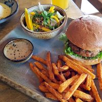 "Sunshine Hamburger" with pineapple and sweet potato fries at Sunshine Vegan Restaurant in Berlin