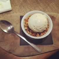 Pear crumble with vanilla ice cream at The Sun in Carshalton