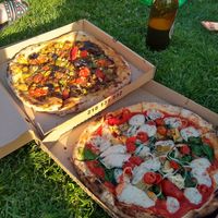 Veganella pizza and a pizza with vegan mozzarella at RetroGusto84 in Lisbon