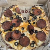 9” personal pizza with vegan pepperoni, vegan cheese, black olives, Buffalo sauce  at Rapid Fired Pizza in Wichita Falls