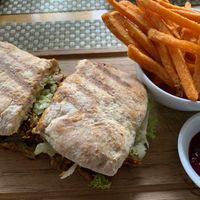 “Pulled pork” sandwich made with mushrooms. Served with sweet potato fries and beet ketchup   at Lavka in Guatemala City