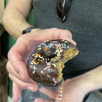 Chocolate covered gluten free donut 🍩   at Organic Tree in Dana Point