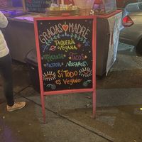 Menu/street signage at Gracias Madre in Mexico City