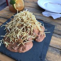 Baked potato loaded with mushroom stroganoff at Casa de Nara in Joao Pessoa