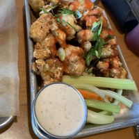 Buffalo Cauliflower
Breaded cauliflower, fried and served with a vegan Buffalo sauce and vegan malt vinaigrette dressing   at Idyllwild Brewpub in Idyllwild