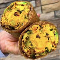  Vegan scramble wrap:
 Seared tofu, brussels sprouts, caramelized onion, vegan cheese, avocado, whole wheat tortilla   at Greens N Things in Brea