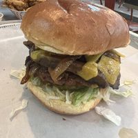 Impossible burger with vegan cheese, lettuce, tomatoes, pickles, marinated mushrooms, and caramelized onions  at Wicked Fresh Craft Burgers in North Conway