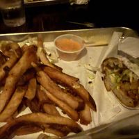 Vegan chicken wrap (half eaten) and amazing fries.  at Victoria Bar in Portland