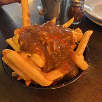Vegan poutine (unfortunately bland - gravy had no flavour)   at Fat Badgers Pizza Bar in Queenstown