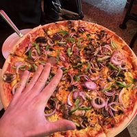 E-nooooooormous!!!!!  at Fat Badgers Pizza Bar in Queenstown