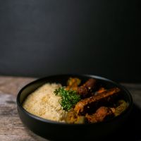 Vegan traditional couscous with vegan sausage and vegan soybeans meatballs at Friendship Concept in Pai