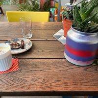 My comforting turmeric black pepper almond milk latte with my scrumptious chocolate desserts at Carbon Fresh in London