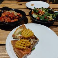 Pizza with salads at Pizza Fan in Nicosia