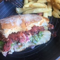 inside of Garden of Souls burger. veggie patty of kumara, chickpea, beetroot  at Halo in Queenstown