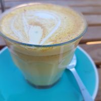 Turmeric latte with macadamia milk at Gardener's Lodge in Camperdown