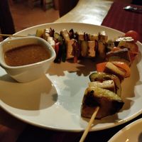 Tofu skewers and satay sauce at Laguna Lodge & Zotz Restaurant in Santa Cruz La Laguna