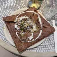 Galette with leek, mushrooms, garlic and soy cream  at Chez Germain in Paris