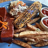 Tofu with barbecue sauce, coleslaw, corn, and fries  at Ravens' Restaurant in Mendocino