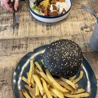 front: Vegan Bad Boy Burger with homemade fries, back: Buddha Bowl  at La Popote D'Ondine in Nice