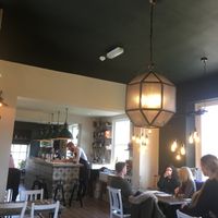 Cute decor. I love the dark ceiling.  at Hypha in Chester