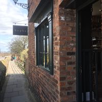 The access to the restaurant is on the Chester wall.  at Hypha in Chester