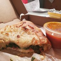 1/2 of my calzone left after the first half filled me up at Pizza Heaven in East Greenwich