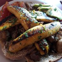 Desayuno completo vegano (mushrooms, grilled bananas, whole wheat bread, beans, tomato, pepper, avocado) at Botanique Cafe in Curitiba