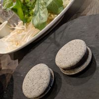 The black sesame chocolate macaron was spectacular!! Thank you Chef Phong for creating such a master piece!  at Pho de Nguyen in San Bruno