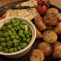 Roast 'chicken' with creamy mushroom sauce with potatoes and peas at Green Loft in Northampton