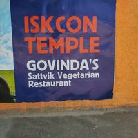 Outside wall.  Pass through security, turn left. at Govinda's in Lusaka