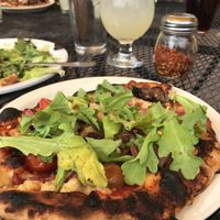 Personal veggie pizza with vegan cheese and added arugula  at Taos Mesa Brewing in Taos
