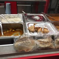 Take away options (Dal, Curry, Samosa) at Lucky Take Away in Biel