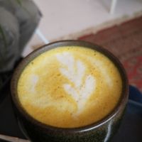 Warming turmeric latte at Passiflora in Seaton