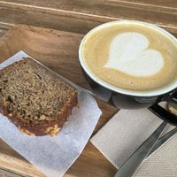 Latte with oat milk + Banana bread   at Jester in Sevilla