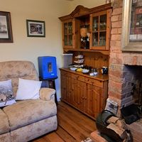 Communal living room/ dining room at Nab Cottage in Bexhill
