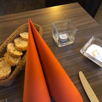 sliced baguette slices with sauce (free appetizer) at Mondrian Burger & Co in Koblenz