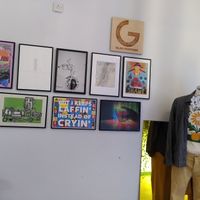 There is a second hand clothing shop next door! at The Glad Cafe in Glasgow