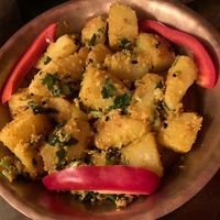 Potatoes with sesame sauce (looks kinda dry but doesn’t feel like it at all - and the spices in this one are SO good)  at YAK + YETI in Vienna