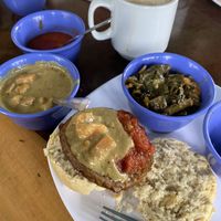 Collards, Vegan biscuit, sweet potato coconut curry, creole gravy (tomato sauce), veggie sausage, latte. I forgot to take this photo before I spooned some curry onto my biscuit  at Biscuit Head - Haywood in Asheville