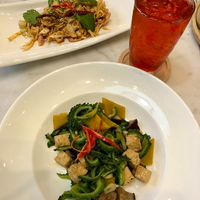 Banana blossom salad (good). Pumpkin and bitter gourd (quite bitter). at Tonklar Facai - Chula in Bangkok