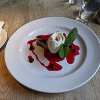Vegan polenta cake with vegan vanilla ice cream at The Pine Marten in Harrogate