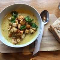 creamy corn soup with thyme croutons 💕  at Veganika in Ljubljana