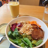 Salad with buckwheat and yellow smoothie at Veganika in Ljubljana
